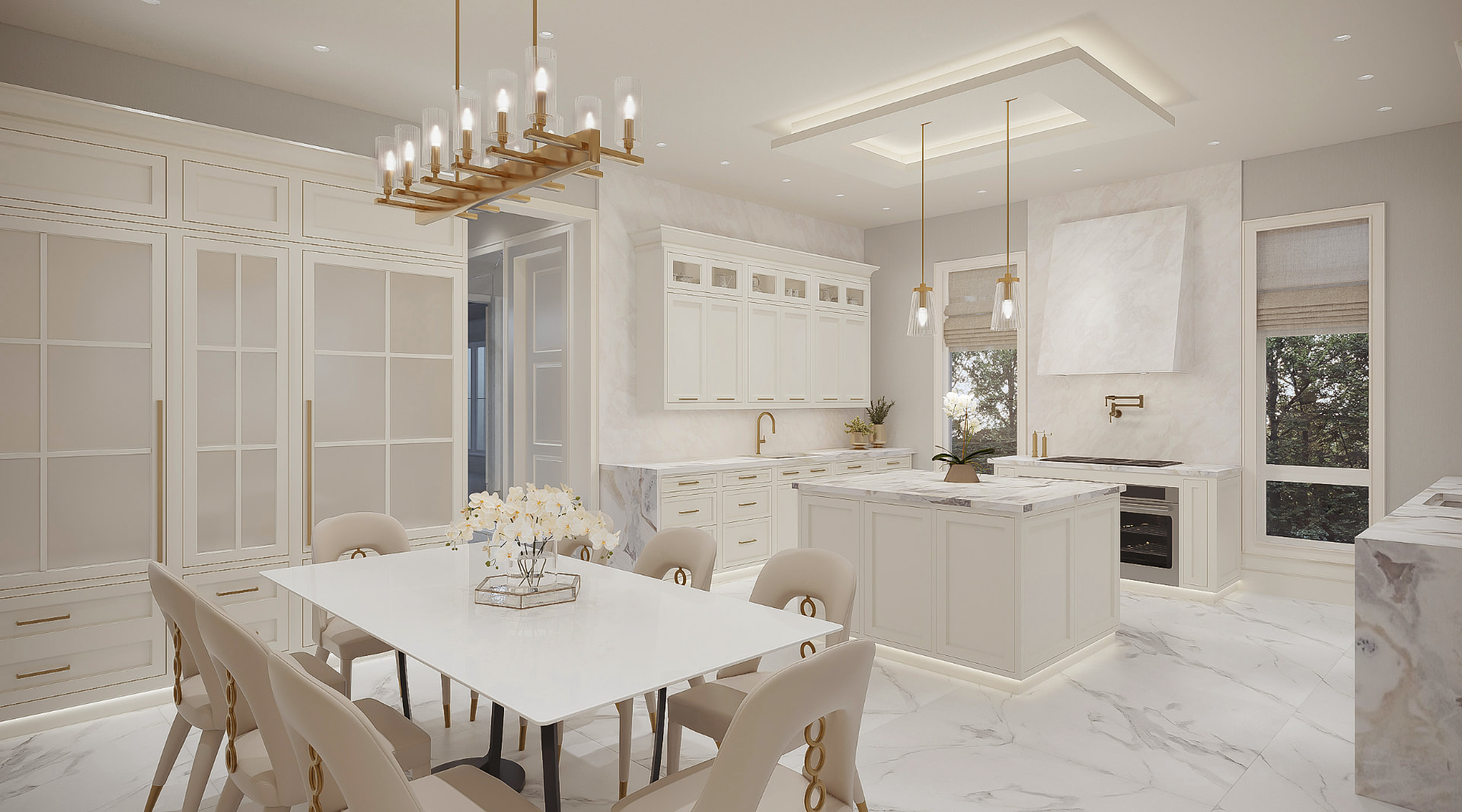 White paneled kitchen with marble worktops, brass lighting and breakfast table